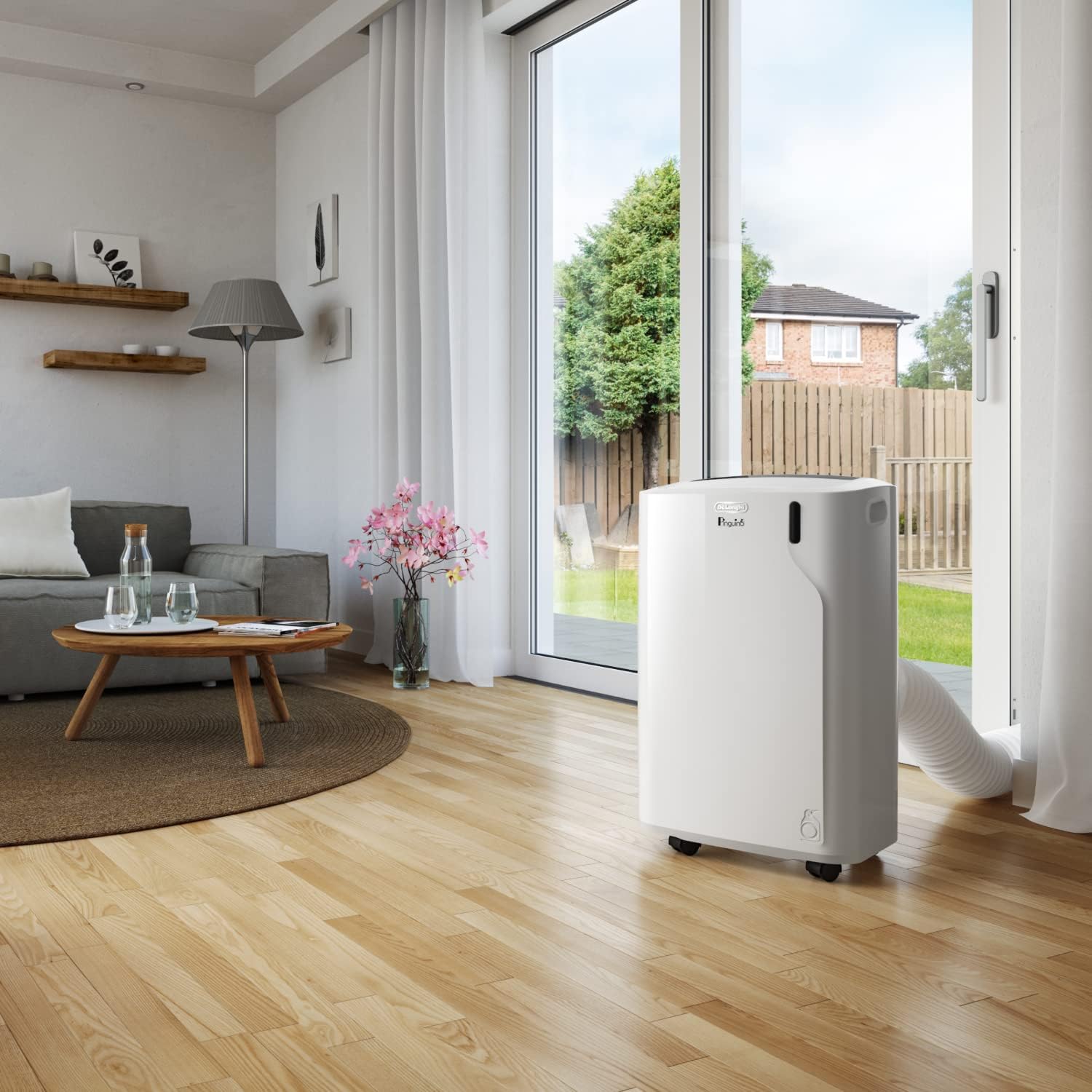 Pinguino 3-in-1 Klimagerät, 9400 BTU, bis 27 m², Entfeuchter + Ventilator, leise, Fernbedienung, 24h-Timer, Effizienz A (PACEM82)